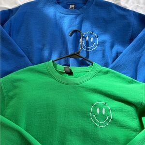Set of 2 Blue and Green Smiley Face Sweatshirts